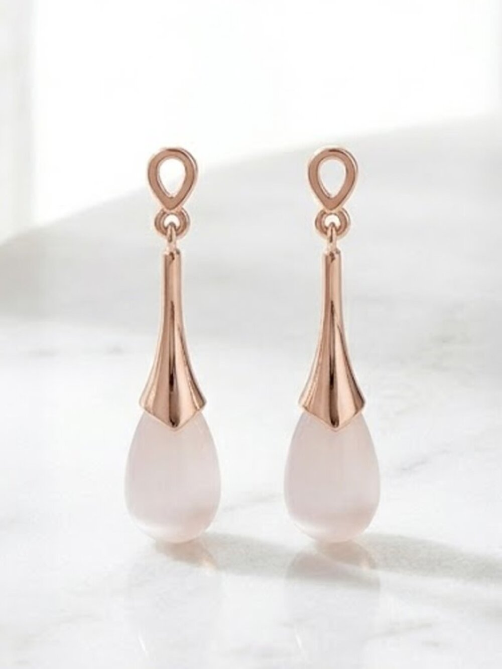 Ladies Teardrop Rose Gold Opal Earrings